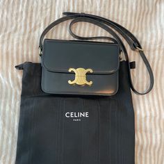 Brand New. Only Worn A Few Times. In Perfect Condition. Luxury Tan Flap Bag With Removable Pouch, Luxury Black Calf Leather Flap Bag, Tan Luxury Flap Bag, Timeless Calf Leather Shoulder Bag, High-end Calf Leather Shoulder Bag With Dust Bag, Chic Tan Bag For Everyday Luxury, Black Timeless Shoulder Bag For Everyday Luxury, Celine Teen Triomphe Bag, Celine Teen Triomphe