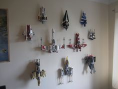 a wall that has some legos on it and is decorated with star wars figures