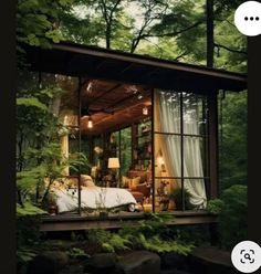 an image of a bedroom in the woods with trees and plants on it's side