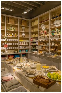 a room filled with lots of plates and bowls