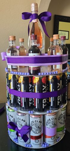 a basket filled with lots of bottles on top of a table