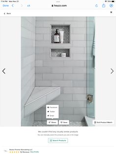 a white tiled shower with shelves above and below the bathtub is featured on instagram