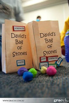 two bags that say david's bag of stones are on the floor next to each other