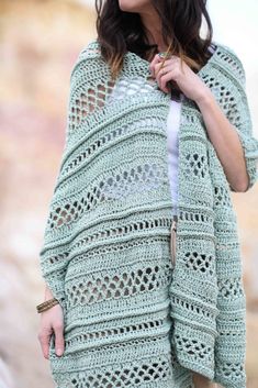 a woman wearing a crochet shawl with text overlay that says summer tide wrap