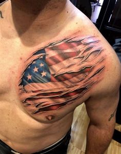 a man with an american flag tattoo on his chest