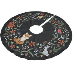 a black and orange floral design with cats on it