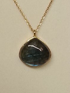 Beautiful Blue Labradorite pendant and gold plated chain. Elegant Labradorite Necklace With Adjustable Chain, Gold Labradorite Oval Pendant Necklace, Gold Labradorite Teardrop Pendant Jewelry, Gold Oval Pendant Necklace In Labradorite, Gold Teardrop Labradorite Necklace, Elegant Gold Necklace With Labradorite, Luxury Teardrop Gold Chain Jewelry Gift, Elegant Gold Labradorite Necklace, Gold Labradorite Necklaces As Gift