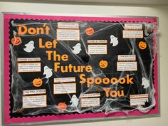 a bulletin board that has been decorated with words and pictures on it, including ghostes