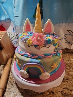 there is a cake that looks like a unicorn