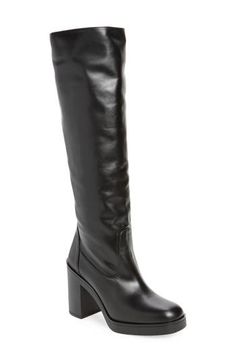 Elevate a wide range of looks with this knee-high boot artisanally crafted in Spain and set on a subtle platform and walkable block heel. 3 3/4" heel 15 1/4" shaft; 15 1/2" calf circumference Side zip closure Leather upper/synthetic linen/leather sole Made in Spain Fall Calf Leather Knee-high Boots With Block Heel, Winter Calf Leather Knee-high Boots With Stacked Heel, Leather Tall Platform Boots With Stacked Heel, Formal Platform Boots With Block Heel For Fall, Calf Leather Knee-high Boots With Block Heel, Leather Platform Boots With Block Heel, Leather Knee-high Platform Boots With Stacked Heel, Knee-high Leather Platform Boots With Stacked Heel, Chic Leather High Shaft Platform Boots