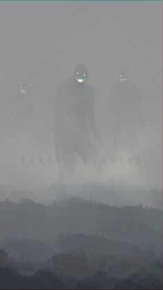 three people standing in the fog on top of a hill with their faces glowing green