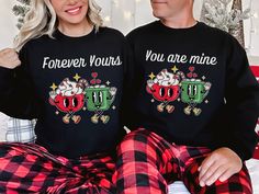 Get into the holiday spirit with our Fun Couple Christmas sweatshirt set! These cute couples Christmas sweaters are the perfect choice for spreading joy and merriment during the festive season. Designed for making a stylish statement at Christmas parties, these matching Christmas sweatshirts will have you and your partner looking adorable and coordinated as you celebrate the most wonderful time of the year! Gildan 18000 Brand Sweatshirt ▶Unisex Adult Sizing ▶See Our Size Chart for Proper Sizing ▶Any rolled sleeves are for styling purposes only ▶Props used in photos are not included with the purchase. ✈ PROCESSING & SHIPPING ✈ T-Shirts, Sweatshirts, and Hoodies Processing Time: 3-5 business days Standard Shipping: 2-5 business days after processing time Mugs Processing Time: 3-5 business da Ugly Sweater Couple, Couple Sweaters, Couple Embrace, Couples Christmas Sweaters, Couples Christmas, Couples Sweaters, Couple Christmas, Couples Sweatshirts, Matching Couple