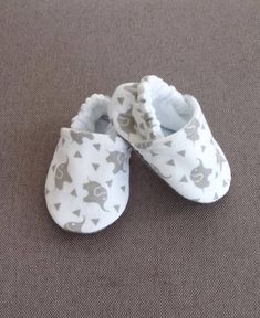 Elephant  style baby shoes  Size 1 (0-3 months) 3.5 in Size 2 (3-6 mo) 3.75  Size 3 (6-9 Mo.) 4.25 Size 4 (9-12 mo) 4.5 Non slip bottoms Size 5 (12-18 mo.) 5.25 walker  Size 6 18-24 months walker Baby items can be washed in washing machine on gentle or washed by hand in warm water. ALL ITEMS ARE HANDMADE TO ORDER  Shipping time is 1-2 weeks  Please verify your mailing address at time if order  Any questions please send a message me will try to answer within 24 hours  Thank you for looking :) Playful White Booties For Playtime, Cute White Booties With Soft Sole, Cute White Slip-on Booties, White Slip-on Cute Booties, White Slip-on Booties For Playtime, Elephant Fashion, Elephant Theme, Baby Shoe Sizes, Elephant Baby