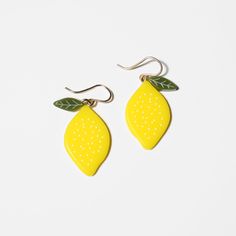 Lemon Earrings from WOLL Jewelry. Our collection of fruit earrings are made in San Francisco, California. Yellow Fruit Design Earrings As Gift, Yellow Fruit Design Earrings Gift, Yellow Fruit Design Earrings For Gift, Fruit Design Drop Earrings As Gift, Fruit Design Drop Earrings For Gift, Yellow Earrings For Gift, Yellow Earrings For Gifts, Yellow Pierced Earrings For Gift, Yellow Pierced Earrings As A Gift