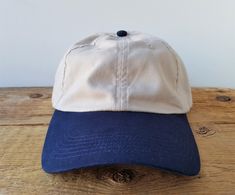 Vintage casual khaki beige and navy blue cotton cap with adjustable strap and lift buckle for easy adjusting. Made by HSQ Harvard Square. Fits most adult hat sizes. Adjustable strap allows for hat sizes from 6 7/8 up to 7 5/8 Condition: Excellent vintage shape - Deadstock, never worn Here's a shortcut to view more of our dad hats: https://www.etsy.com/shop/HatsForward/items?ref=listing-shop2-all-items-count&search_query=dad%2Bhat ..and if you're purchasing more than one we automatically combine Harvard Square, Blank Hats, Vintage Casual, Dad Hat, Hat Sizes, Metal Buckles, Vintage Stil, Trucker Cap, Dad Hats