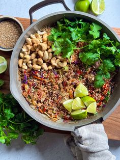 a pan filled with rice, beans and cilantro