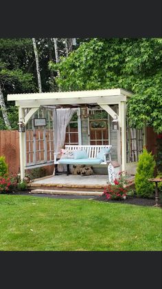 a gazebo in the middle of a yard