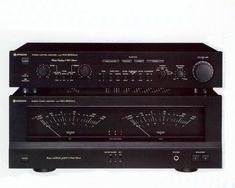 two black stereo equipment sitting on top of each other