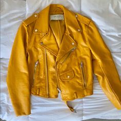 Zara Mustard Yellow Faux Leather Jacket Sz Small. Brand New Without Tags. 100% Polyester. Comes With Matching Optional Belt. Yellow Leather Jacket With Long Sleeves, Yellow Leather Long Sleeve Outerwear, Yellow Leather Jacket For Winter, Yellow Leather Winter Outerwear, Zara Yellow Outerwear For Work, Yellow Fitted Long Sleeve Biker Jacket, Zara Casual Yellow Outerwear, Yellow Long Sleeve Leather Jacket, Trendy Yellow Biker Jacket For Winter