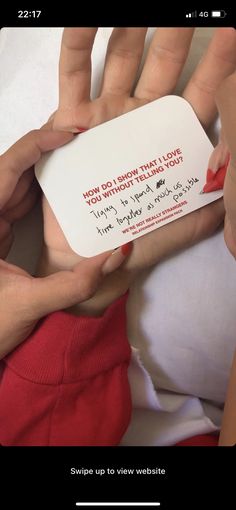 two hands holding a white card that says, how do you give them all the love?