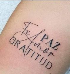 a tattoo with the words paz and gratitud on it