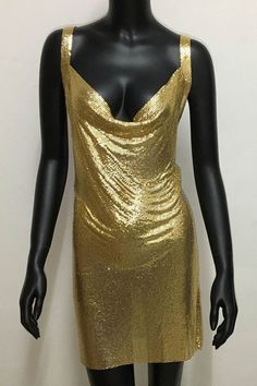 As a product expert, I present to you the stunning Halter Silver Gold Sequined Homecoming Dresses. These dresses feature a halter neckline and are adorned with silver and gold sequins, making them perfect for any special occasion. The sequins add a touch of glamour and will surely make the wearer stand out in a crowd. Elevate your wardrobe with these beautiful and sophisticated dresses. Details: Dress Style: A-Line Color: Silver, Gold Neckline: V-Neck Sleeves: Sleeveless Back Style: Zipper Gold Sleeveless Mini Dress With Contrast Sequin, Gold Party Mini Dress With Contrast Sequin, Gold Mini Dress With Contrast Sequin For Party, Glamorous Gold Mini Dress With Contrast Sequin, Gold Backless Holiday Dress, Glamorous Gold Backless Dresses, Glamorous Halter Neck Sequin Holiday Dress, Glamorous Halter Neck Sequin Dress For Holidays, Gold Backless Dress For Party Season