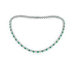 This elegant Natori necklace is designed in 14k white gold. The lush green emeralds and sparkling diamonds are alternately bezel-set in lustrous hexagonal frames, displaying an exquisite look. Green Diamond Necklace For Formal Events, Formal Emerald Necklaces With Single Cut Diamonds, Formal Green Diamond Necklace For May Birthstone, Green Emerald Necklace With Brilliant Cut For Formal Occasions, Green Emerald-cut Diamond Necklace, Classic Green Emerald Necklace With Diamond Accents, Fine Jewelry Green Necklaces With Diamond Accents, Fine Jewelry Green Necklace With Diamond Accents, Green Necklace With Single Cut Diamonds For Anniversary