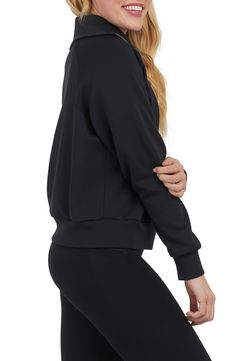 A modal-enhanced blend adds comfort to a half-zip sweatshirt styled with a stand collar and slightly split cuffs. 23" length (size Medium) Stand collar Long sleeves 47% modal, 46% polyester, 7% elastane Dry clean or machine wash, tumble dry Imported Versatile Funnel Neck Top With Ribbed Cuffs, Athleisure Turtleneck Top With Ribbed Cuffs, Athleisure Sweatshirt With Funnel Neck And Ribbed Cuffs, Athleisure Funnel Neck Sweatshirt For Layering, Athleisure Half-zip Sweatshirt With Ribbed Collar, Sporty Turtleneck Sweatshirt With Ribbed Cuffs, Athleisure Funnel Neck Top With Ribbed Collar, Athleisure Top With Funnel Neck And Ribbed Collar, Athleisure Long Sleeve Track Jacket For Layering