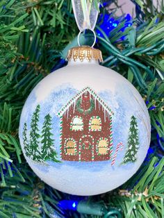 a christmas ornament hanging from a tree