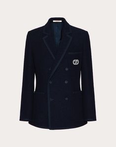 Valentino double-breasted bouclé wool jacket with VLogo Signature embroidery - Slim fit - Lined - VLogo Signature embroidery on left breast pocket as worn - Button fastening - Two front patch pockets - One left breast pocket as worn - Composition: 72% Wool, 19% Polyamide, 9% Silk - Lining: 100% Cupro - Length: 76 cm / 29.9 in. from the back of the neck in an Italian size 46 - The model is 187 cm / 6'1" tall and wears an Italian size 46 - Made in Italy The look of the model is completed by V Designer Pea Coat With Notch Lapel, Designer Wool Pea Coat, Luxury Double-breasted Tweed Jacket, Wool Jacket, Valentino Garavani, Online Boutique, Double Breasted, Top Brands, Composition