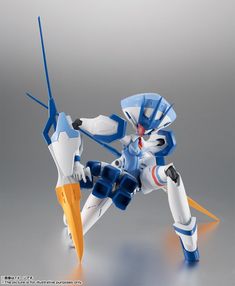 an action figure is posed on a gray background with white and blue accents, while the image appears to be in full color