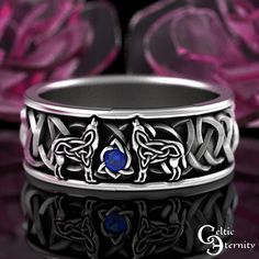 See this ring with more stones and metals: www.etsy.com/shop/CelticEternity?search_query=1170 Band Height 7.4mm Stones: 1x 2mm Sapphire Two intricate Celtic wolves join voices over a sparkling gemstone. The silhouette is created with Celtic knots and blends seamlessly with the traditional Celtic knots that surround it. The wolf is a symbol of guardianship, ritual, loyalty, and spirit. Wolf has the ability to make quick and firm emotional attachments, and can trust their own instincts. Every ring is handmade to order and in YOUR CUSTOM size; we do not keep backstock. Please buy our refundable ring sizer (BEFORE ORDERING) as most rings cannot be resized because of the continuous knotwork: www.etsy.com/listing/937178260 About This Item: Cast in solid 925 sterling silver (nickel-free), these r Mens Eternity Wedding Bands, Western Engagement Rings, Wolf Wedding, Eternity Engagement Band, Celtic Wolf, Spirit Wolf, Wedding Band Silver, Western Engagement, Wolf Ring