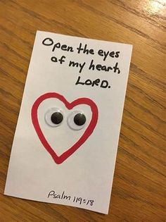 a piece of paper with a heart and eyes on it that says open the eyes at my heart lord