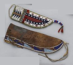 Two Plains beaded knife sheaths Including a Crow example, the front of commercial hide and partially beaded with an alternating banded triangle design; the other Sioux-made, the main panel with cruciform and box motifs, serrates above, tin cone accents. length 11 and 7 3/4in Native American Knife Sheath, Fur Trade, A Crow, Native American Heritage