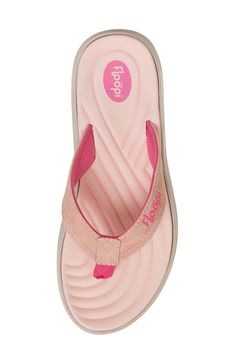 A wave texture brings traction and style to a flip-flop cushioned by a molded footbed and grounded by a nonslip EVA sole. Textile upper and lining/synthetic sole Imported Textured Footbed Synthetic Slip-on Flip Flops, Beach Foam Sandals Slip-resistant, Slip-resistant Foam Sandals For Beach, Comfortable Synthetic Flip Flops With Ortholite Insole, Pink Synthetic Flip Flops With Removable Insole, Pink Cushioned Flip Flops With Eva Material, Pink Cushioned Flip Flops, Pink Cushioned Eva Flip Flops, Pink Slip-resistant Synthetic Sandals