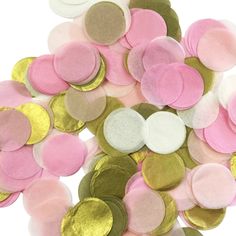 a pile of pink, white and gold confetti