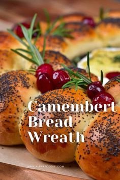 bread with cranberries and rosemary sprigs on top