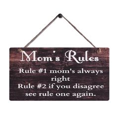 a wooden sign that says mom's rules