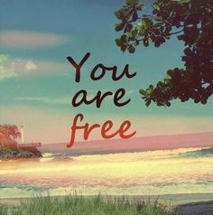 the words you are free written in red ink on a blue sky and beach background