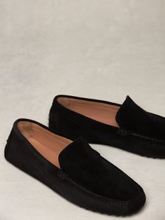 Our signature suede loafer is our best-selling shoe of all time, and for good reason. Our moccasin expert, Norina, handcrafts each piece from a workshop in Tuscany, overseeing every last detail—even using a small flame to singe away stray threads. And now, it’s available in men’s sizes. Masculine Formal Slip-on Moccasins, Masculine Leather Sole Slip-on Moccasins, Masculine Slip-on Moccasins With Stitched Sole, Black Slip-on Moccasins With Stitched Sole, Black Suede Slip-on Tassel Loafers, Suede Loafers, Moccasins, Black Suede, Loafers Men