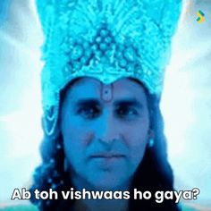 a man wearing a blue headdress with the words ab toh vishwaas ho gaya?