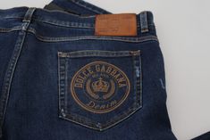 Discover the epitome of Italian craftsmanship with these Dolce & Gabbana denim pants. The luxurious blend of materials ensures a comfortable fit while providing a touch of stretch for ease of movement. Boasting a sophisticated blue washed color, these jeans are designed to elevate your casual style, complete with a chic zipper closure and the iconic logo details that showcase your taste for exclusive fashion. Made in Italy, these denim pants are a versatile addition to your wardrobe. Material: 9 Washed Denim Pants, Dolce And Gabbana Jeans, Casual Denim Jeans, Dolce And Gabbana Blue, Italian Craftsmanship, Iconic Logo, Dolce E Gabbana, Washed Denim, Italian Luxury