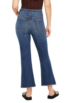 Light distressing gives a lived-in look to stretch-kissed flare jeans boasting a cropped length that's perfect for sunny days. 26" inseam; 18" leg opening; 11 1/2" front rise; 14" back rise (size 8)
 Zip fly with button closure Five-pocket style 69% preconsumer cotton, 30% lyocell, 1% elastane Machine wash, tumble dry Made in Turkey Black Owned/Founded Spring Flares With Frayed Hem, Casual Flare Pants With Frayed Hem, Summer Flare Jeans With Frayed Hem, Spring Flared Hem Jeans With Frayed Edge, Stretch Flares With Frayed Hem For Spring, Summer Flares With Frayed Hem, Medium Wash Stretch Flare Jeans With Cropped Leg, Stretch Medium Wash Cropped Leg Flare Jeans, Casual Flared Hem Jeans With Frayed Detail