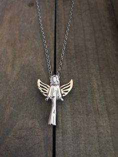 "Listing is for Angel with Rose Gold Colored Wings Urn Necklace, Necklace includes Angel Urn to hold a small amount of cremation ashes and your choice of silver or Rose colored 18 inch Stainless steel chain. Angel Urn is silver with rose gold colored wings 1 1/4\" x 1/2\" Stainless Steel ( ashes can be added at bottom when removing screw ) Necklace will come to you in a gift box :) Funnel, screwdriver and instructions to fill urn are included. Please be sure to follow instructions carefully for Rose Urn Necklace For Ashes, Sterling Silver Rose Gold Memorial Jewelry, Rose Gold Sterling Silver Necklace, Pet Cremation Jewelry, Grandmas Jewelry, Pet Memorial Necklace, Ashes Necklace, Urn For Ashes, Urn Jewelry