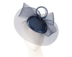 This gorgeous navy headpiece from our beautiful range of cocktail hats, headpieces and special occasion hats is custom made from luxurious fabric with crinoline brim and with comb for comfortable wearing. This hat is ideal for those special occasions such as weddings, Melbourne Cup and Ascot. This cocktail hat is made to order and we can make it in any colour on request. Just tell us the colour you like. We can also make the hat from your fabric.  Made in Australia  Custom made to match your out Elegant Navy Hat For Evening, Elegant Navy Hat With Curved Brim, Elegant Navy Hats With Curved Brim, Elegant Navy Wide Brim Hat, Navy Formal Hat With Curved Brim, Navy Party Hat For Kentucky Derby, Fitted Navy Hat For Kentucky Derby, Navy Hat For Kentucky Derby Party, Navy Curved Brim Formal Hat