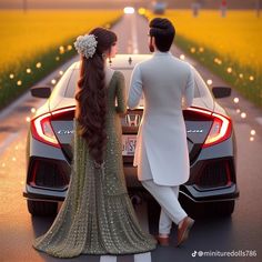 a man and woman standing next to a car