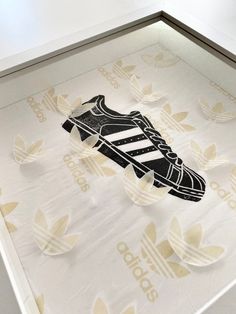 Every time I see the adidas superstars I get butterflies in my stomach, because of the nostalgia inspired by the time in which these iconic sneakers were designed.  There's not a better way to express that feeling, than in a linoleum print on the original adidas tissue paper.  The perfect artwork for any sneakerhead. Superstars Adidas, Iconic Sneakers, Adidas Superstars, Original Adidas, Butterflies In My Stomach, Linoleum Print, Adidas Original, Linoleum, Linocut Prints