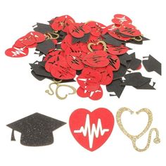 red and black graduation confetti cutouts with stethoscope