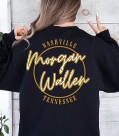 Morgan Wallen Sweatshirt, Wallen Nashville Sweatshirt, Nashville Tennessee Shirt, Wallen Tennessee Shirt, Country Music, Country Music Merch Showcase your love for country music and the vibrant spirit of Nashville with this cozy and stylish sweatshirt featuring the iconic Morgan Wallen. Crafted with comfort in mind, this sweatshirt is perfect for those chilly Nashville nights or cozying up at home while you listen to your favorite tunes. Ideal for any situation, a unisex heavy blend crewneck sweatshirt is pure comfort. These garments are made from polyester and cotton.  .: Made with a medium-heavy fabric blend of 50% cotton and 50% polyester, this sweatshirt feels cozy and is the perfect choice for those colder months. .: The classic fit along with the crew neckline deliver a comfy wearing Morgan Wallen Sweatshirt, Wallen Sweatshirt, Tennessee Shirt, Music Country, Merch Hoodie, Music Merch, Southern Women, Cute Country Outfits, Cute Shirt Designs