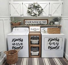 a laundry room with white washers and dryer